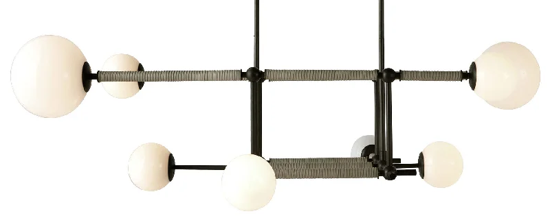 Track lighting for creating a moody atmosphereErica Linear Chandelier